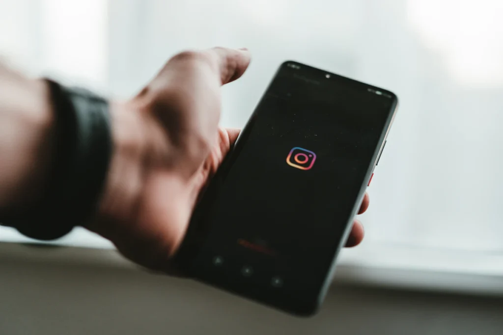 A person scrolling a social feed on a smartphone